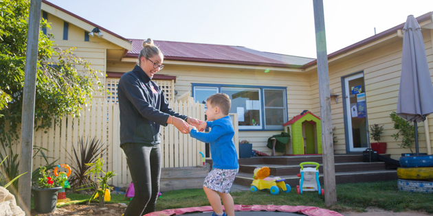 Brooke O'Brien with child at daycare