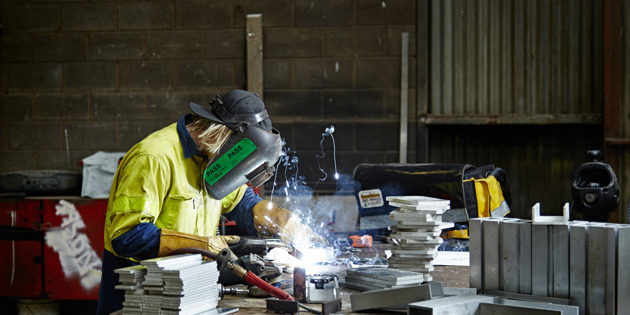 Keppel Prince using a welder