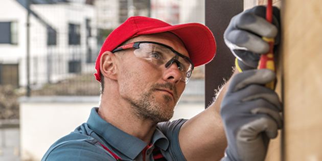 Builder working on a wall