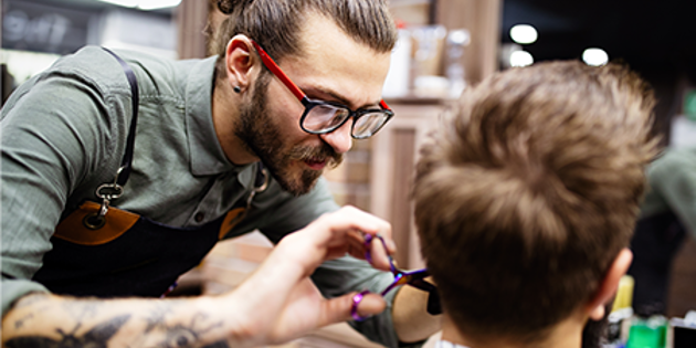 Barber cutting hair