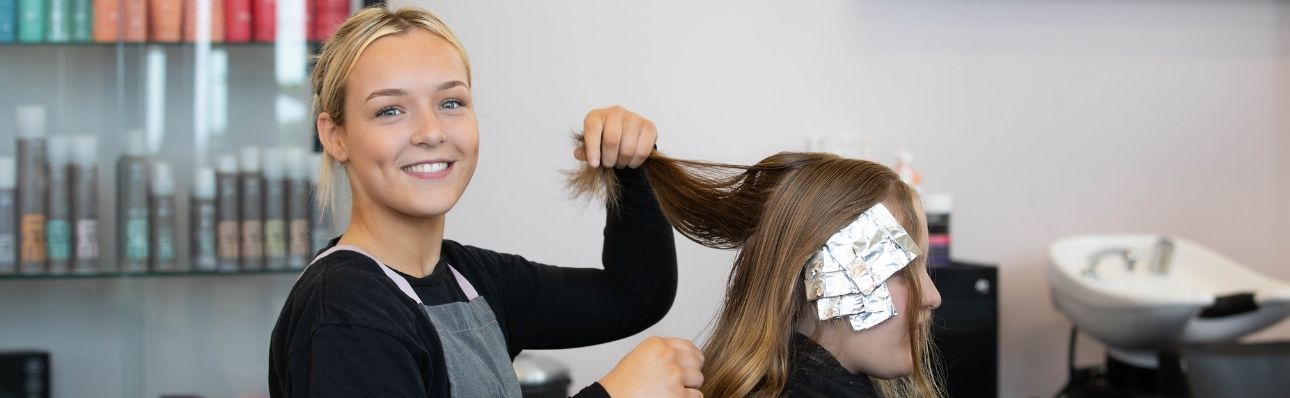 SWTAFE Pure Academy beauty therapists practicing hair styles