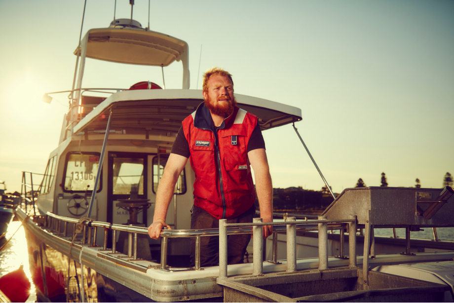 Matthew Smith standing on a pier